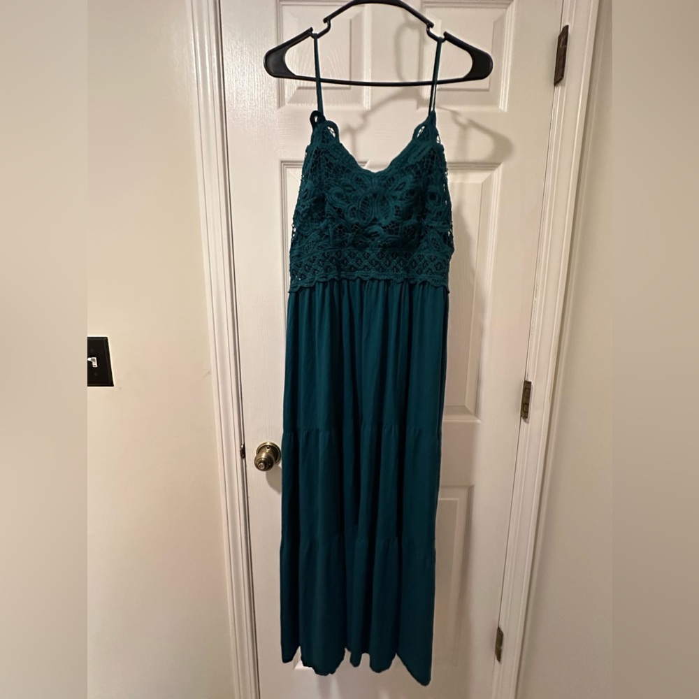 Long green dress with lace top. With see through waistline.